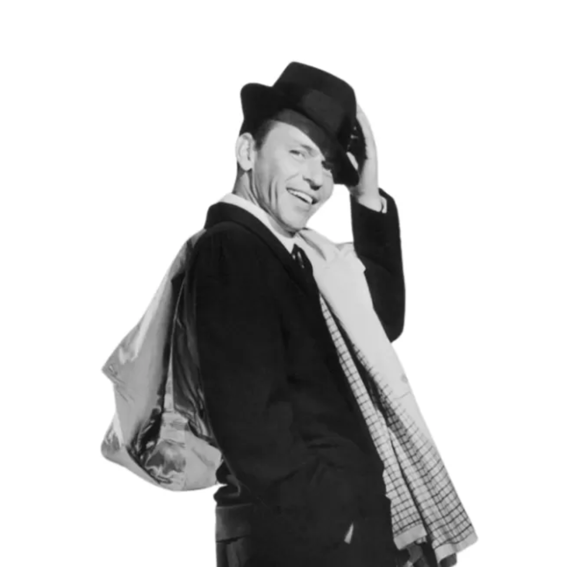 Black‑and‑white portrait of a person in suit and fedora, holding the hat brim with a slight smile