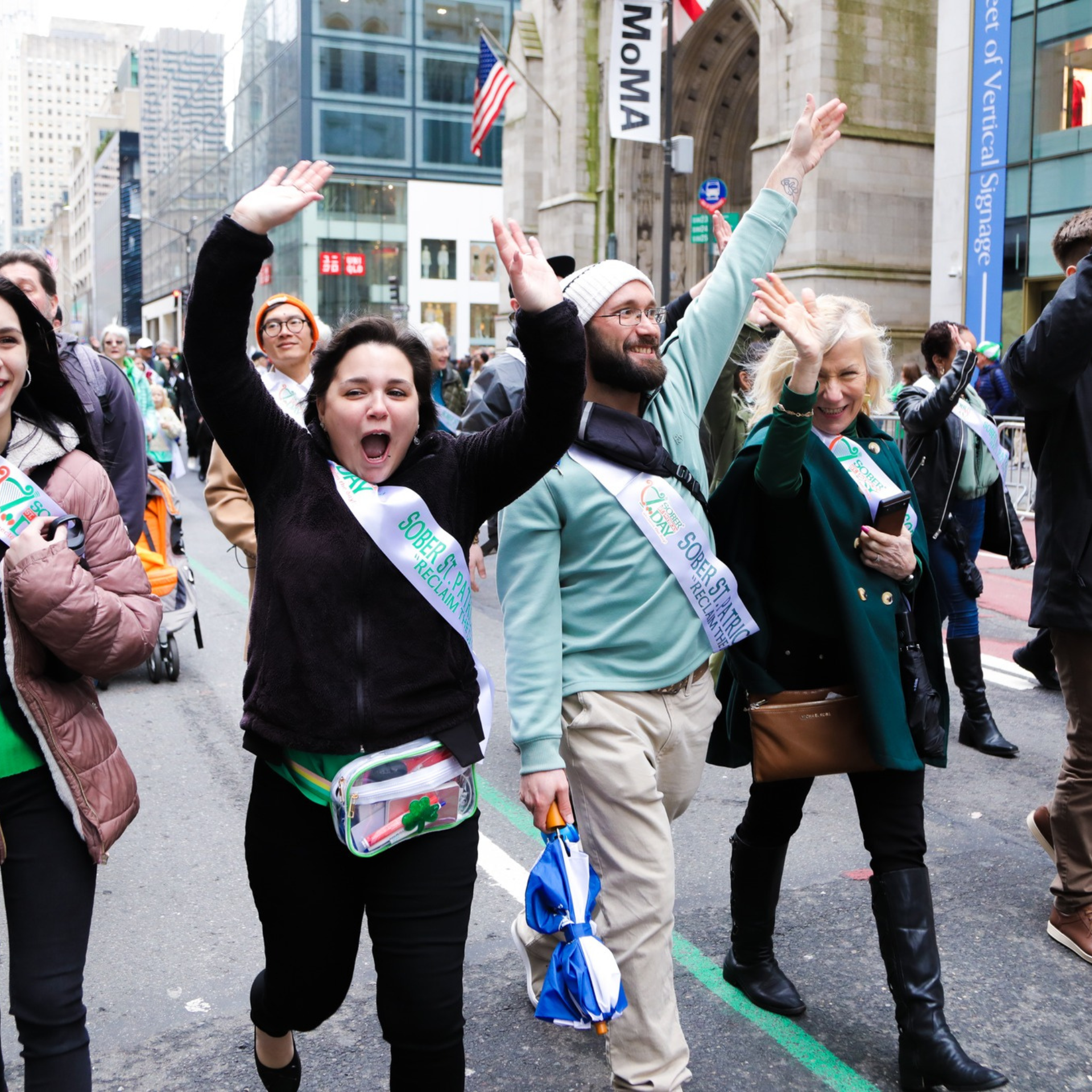 Parade participants in New York City wearing “Sober St. Patrick’s Day” sashes