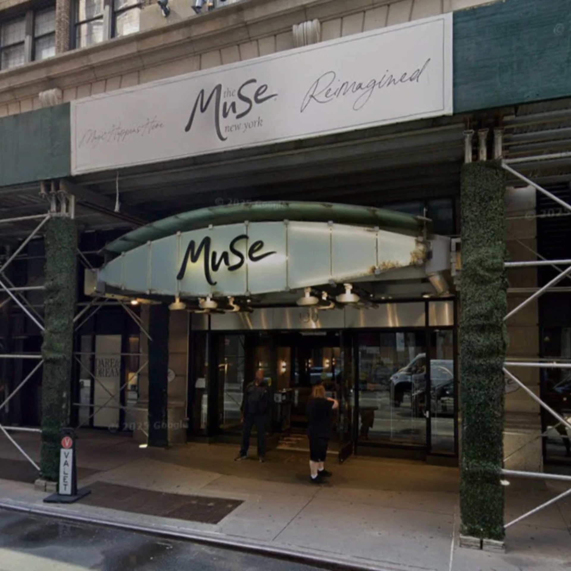 Entrance of The Muse Hotel New York with canopy and signage