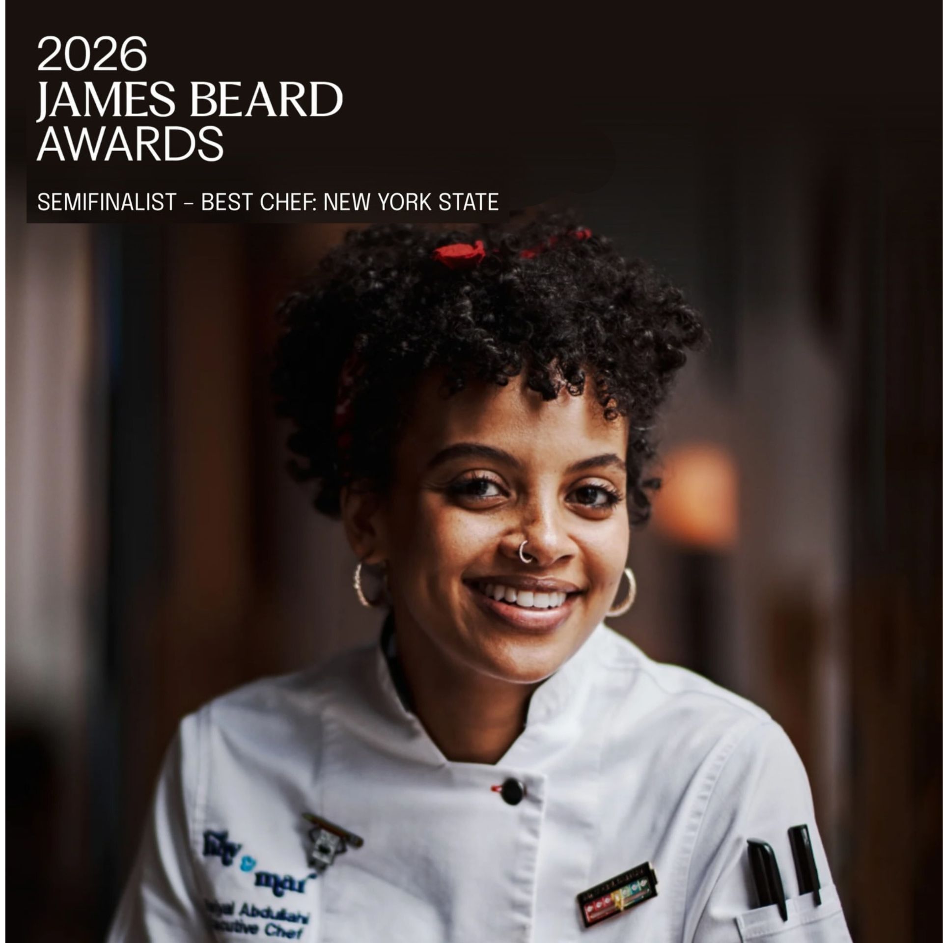 Chef Abigail Abdulah smiling in white chef’s coat, honored as 2026 James Beard Awards semifinalist for Best Chef: New York State