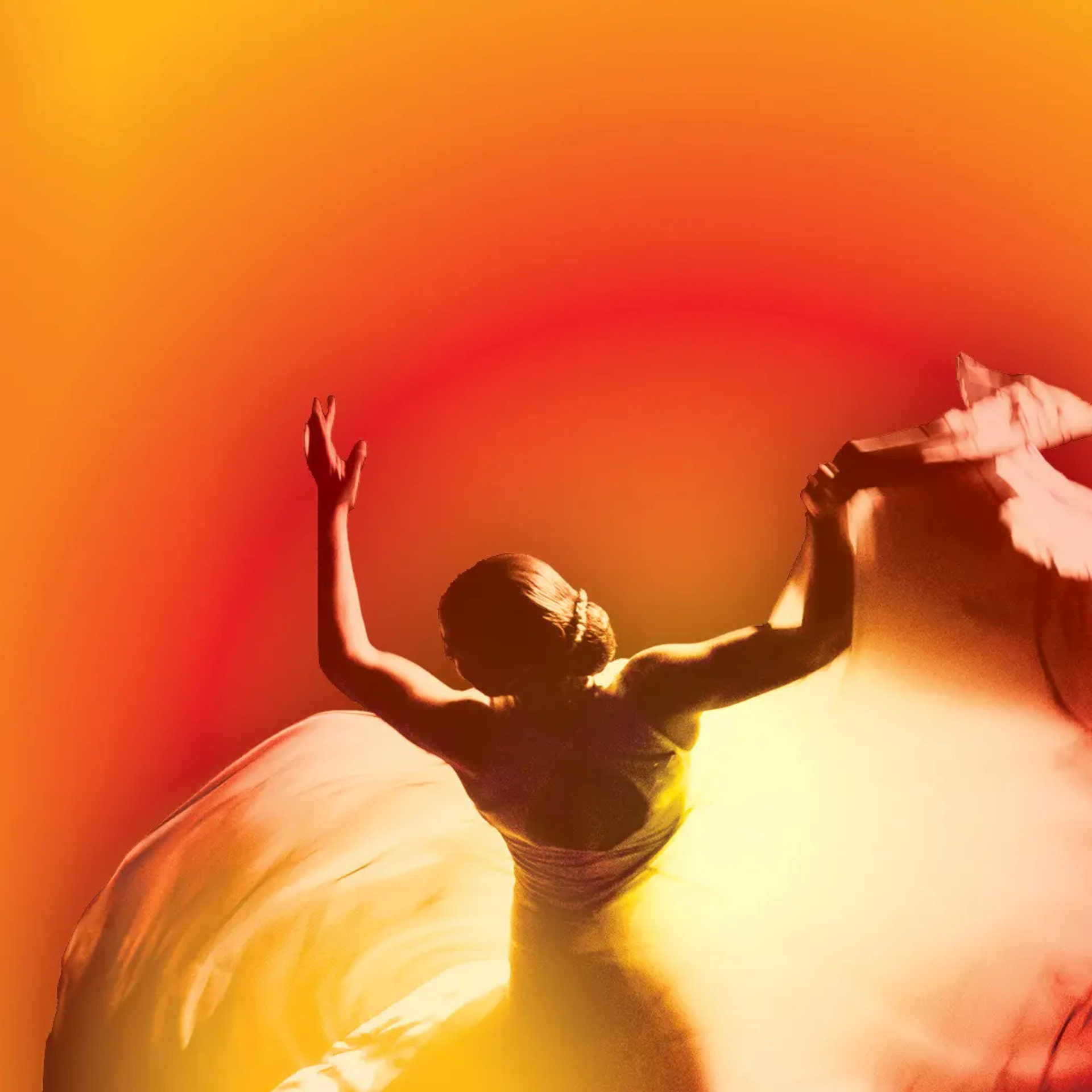 Figure in dark silhouette raises flowing fabric against a vivid red-to-yellow gradient background, evoking motion, energy, and performance