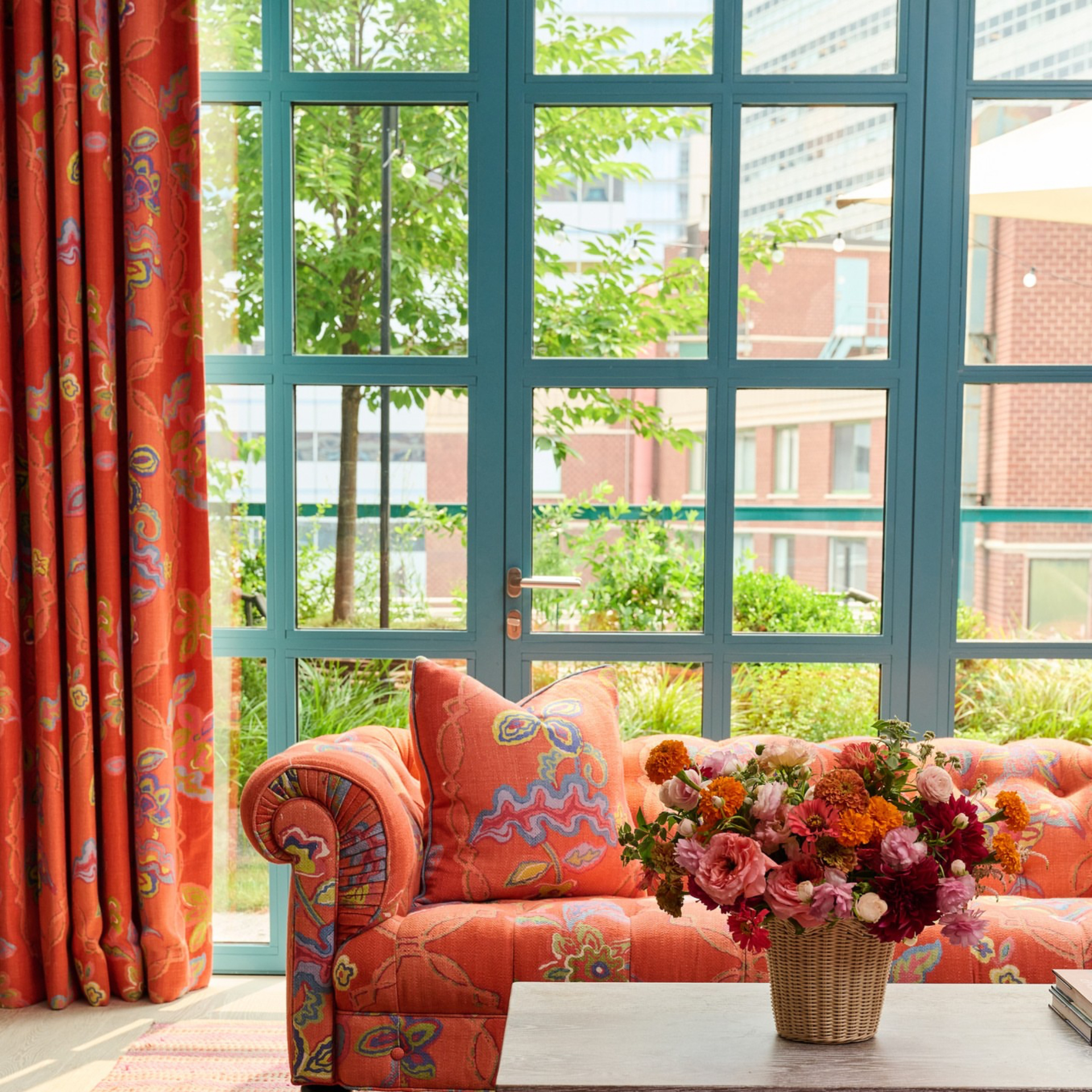 NYC hotel space with natural light and vibrant décor