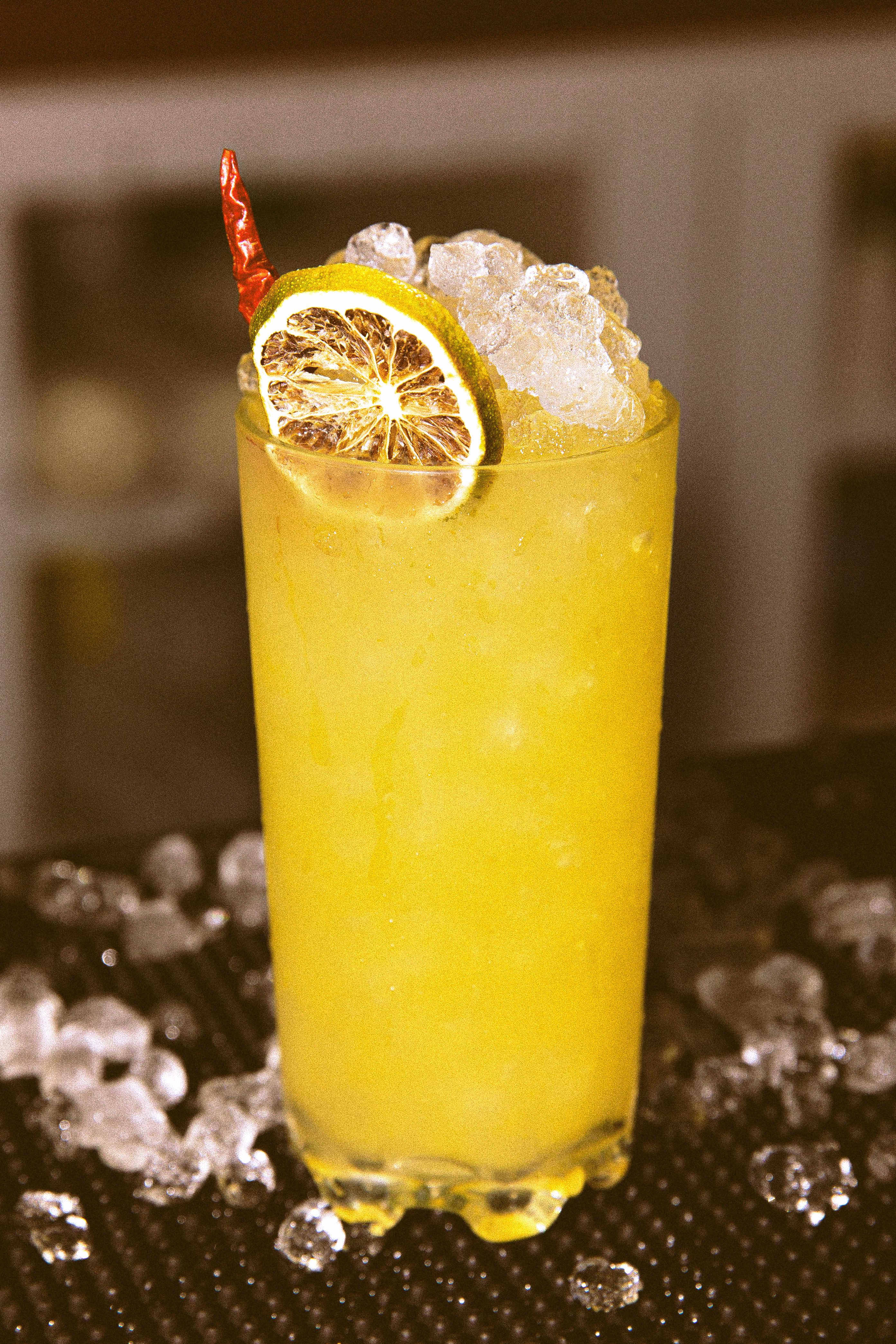 Six Coasts Governors Island: Cocktail with ice, citrus, and chili garnish