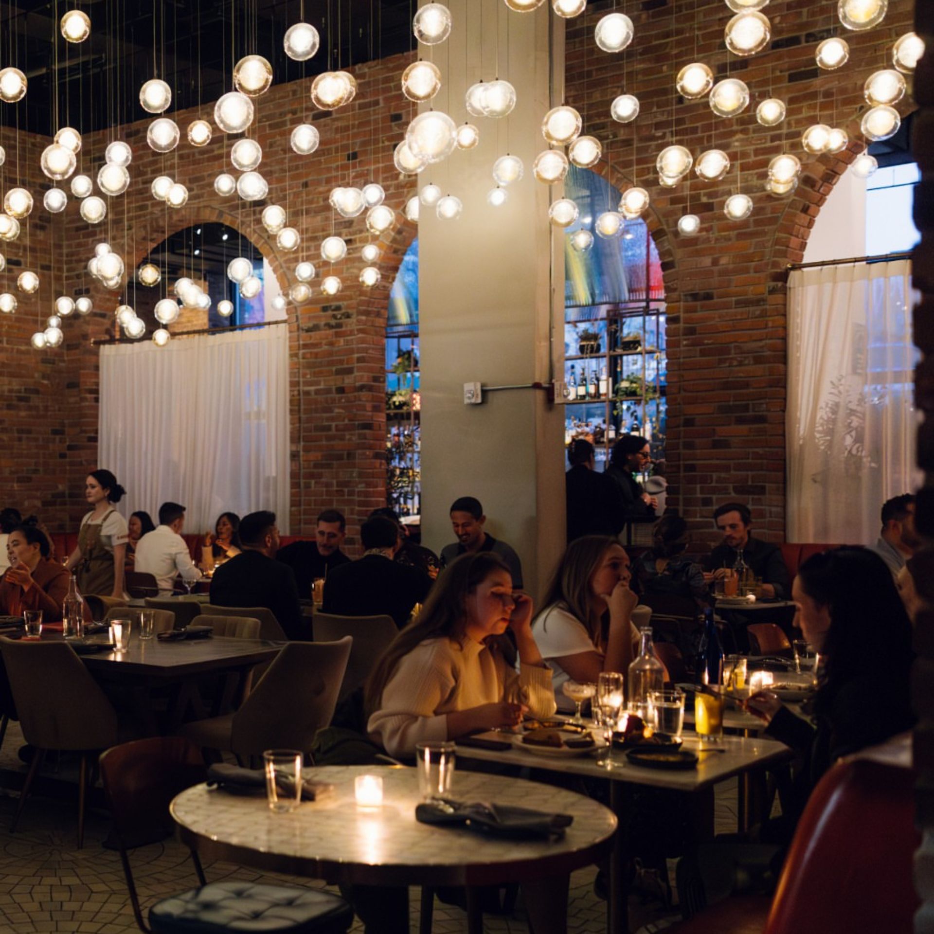 Dining room at Sungold Arlo Williamsburg, Chef Michael King's Mediterranean menu in Brooklyn