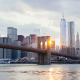 Brooklyn Bridge at sunset with Manhattan skyline and One World Trade Center, iconic New York City landmark for walking tours, sightseeing, photography, and daily things to do in NYC